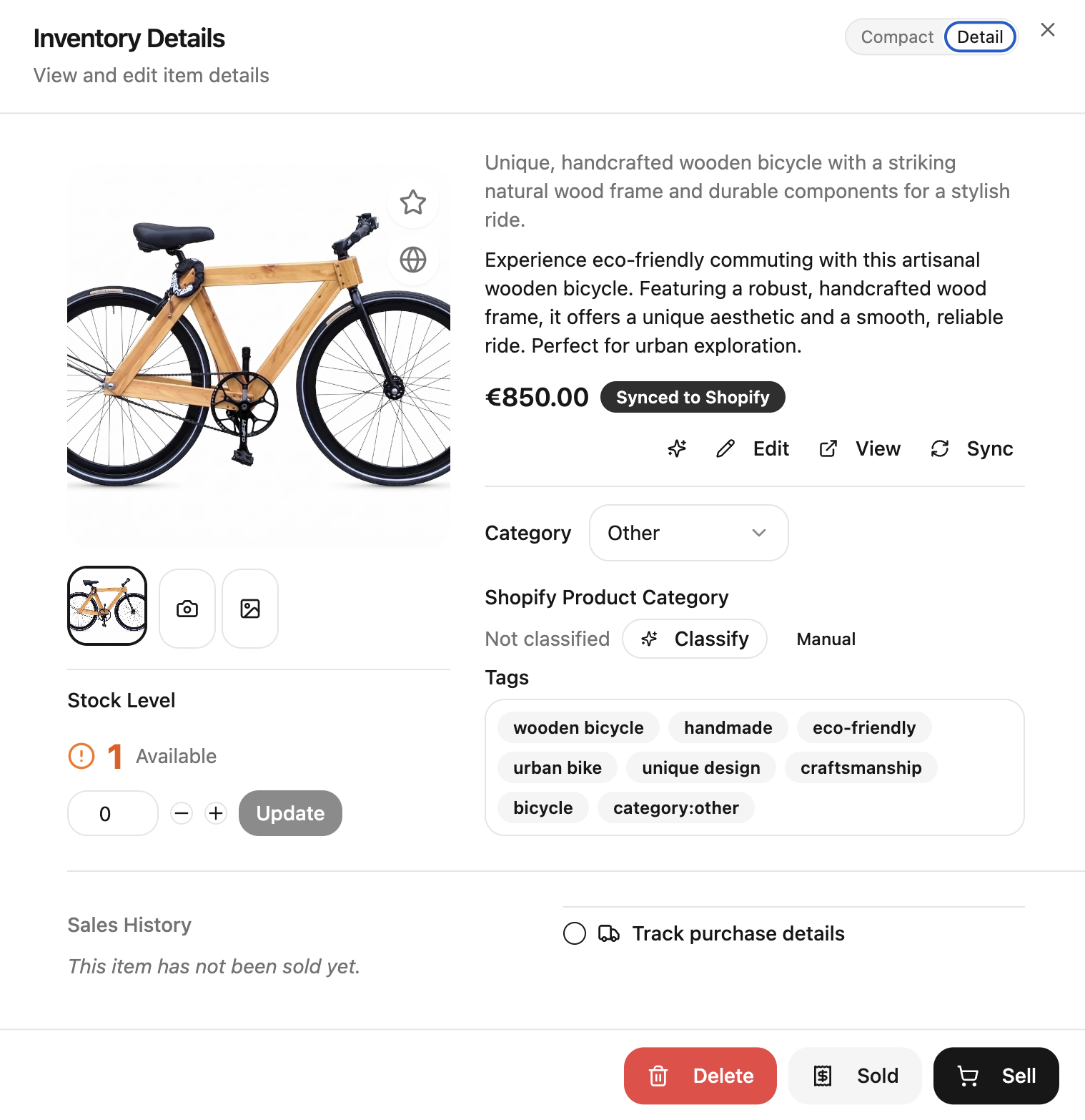 Product detail view showing a wooden bicycle marked Synced to Shopify, with Shopify product category, tags, stock level and sync controls